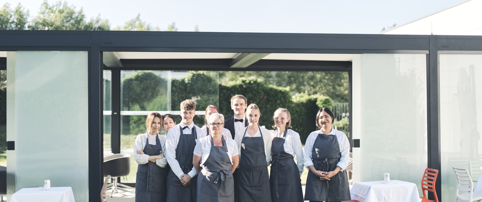 Photo d'équipe dans les jardins